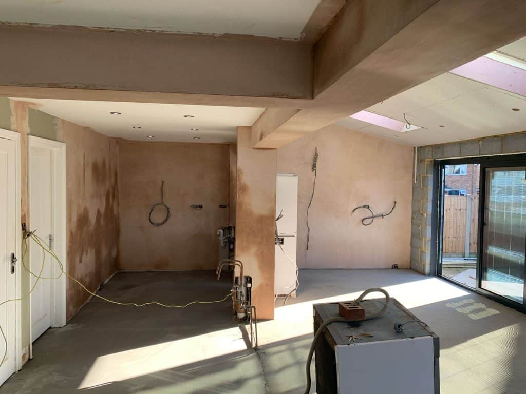 Plastered Walls ready for decoration at a Modern rear Extension by Kirkwood Build